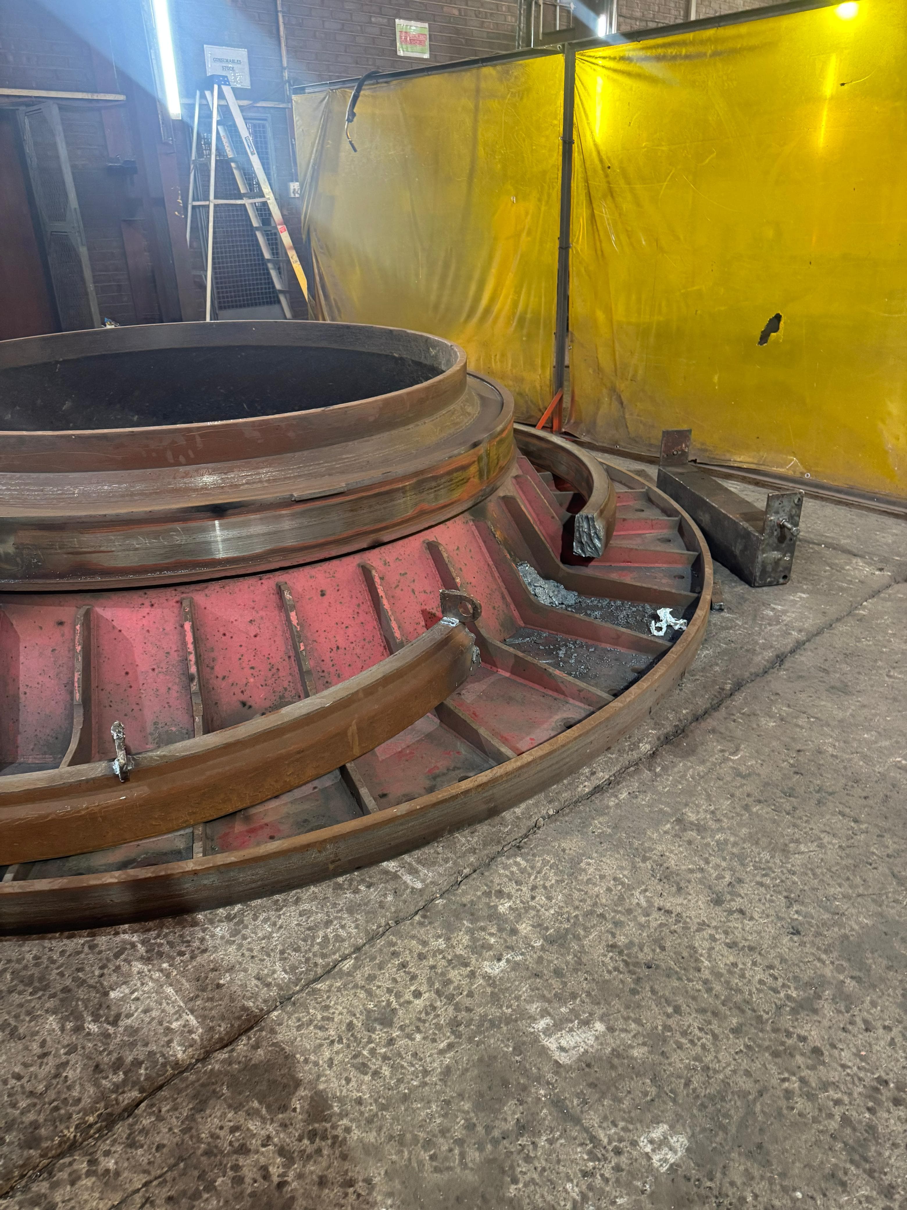 Heavy circular fabrication component during welding and workshop refurbishment